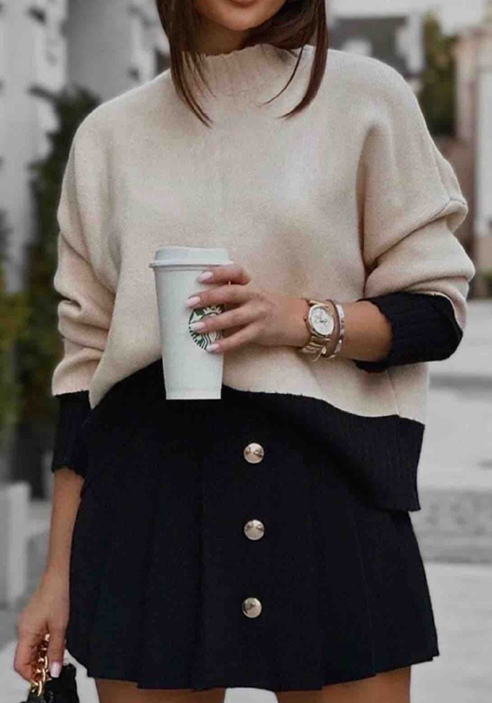 Γυναικείο πλεκτό σε μπεζ και μαύρο με ριμπ γιακά και contrast τελειώματα,