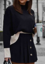 Γυναικείο πλεκτό σε μπεζ και μαύρο με ριμπ γιακά και contrast τελειώματα,