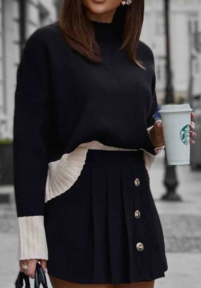 Γυναικείο πλεκτό σε μπεζ και μαύρο με ριμπ γιακά και contrast τελειώματα,