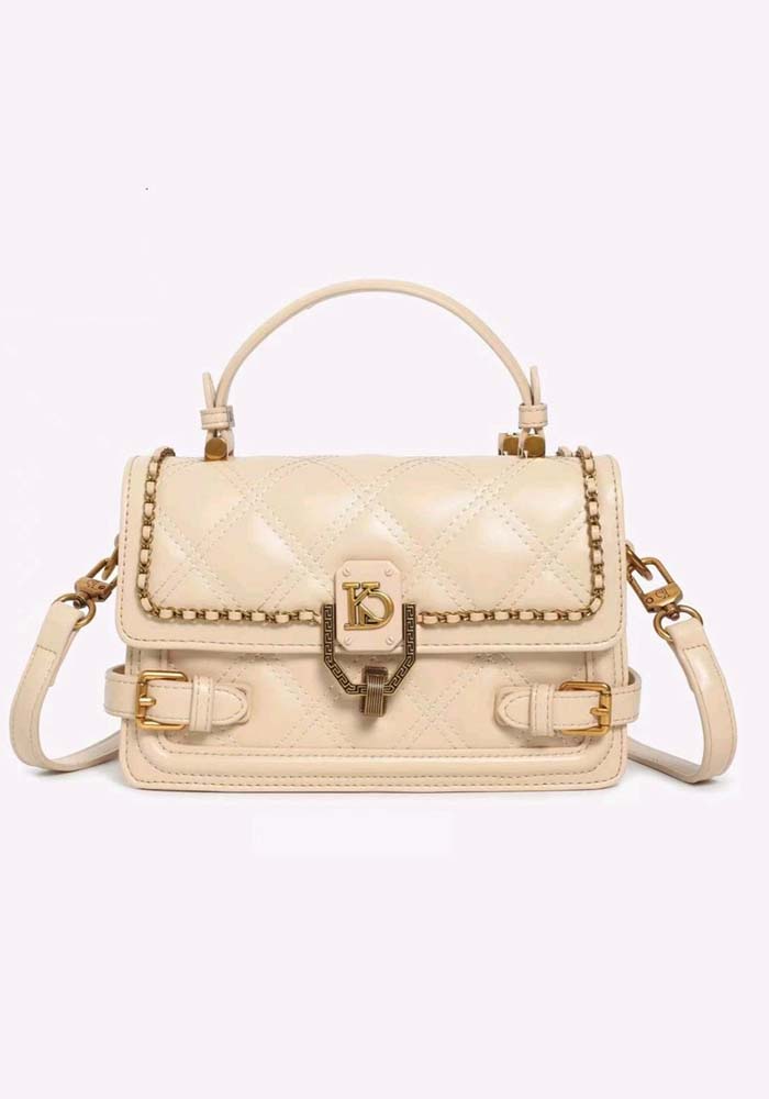 Γυναικεία apricot καπιτονέ τσάντα ώμου με χρυσό κούμπωμα monogram και επάνω χερούλi