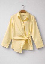 Κίτρινο πουκάμισο με wrap σχέδιο και δέσιμο στο πλάι, μακριά μανίκια και κομψή θηλυκή γραμμή